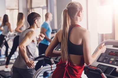 Group of people working out in a gym.
