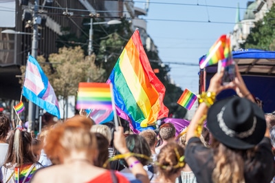 Celebration with rainbow colored flags.