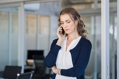 Woman talking on the phone.