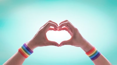 Two hands forming a heart.