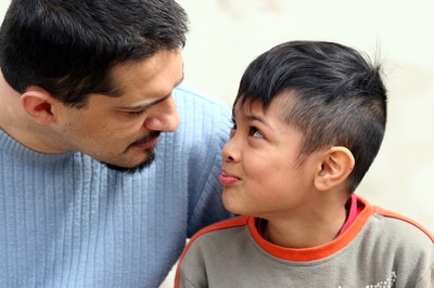 Father speaking to his son.