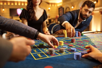 Group of people gambling.