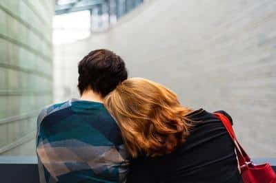Couple cuddling.