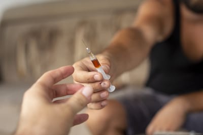 Passing a needle.